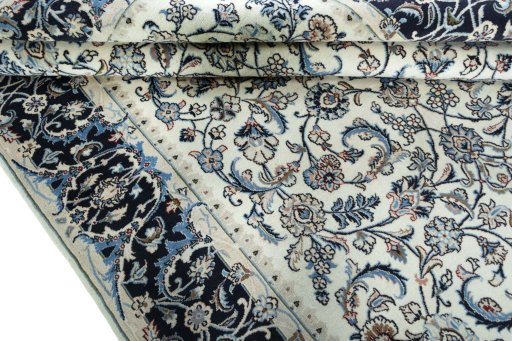 Close-up detail of 2000s Kashmar rug from Iran / Persia showing Wool weave