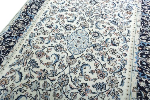 Backside of handmade 2000s Kashmar rug showing knot structure and weave density