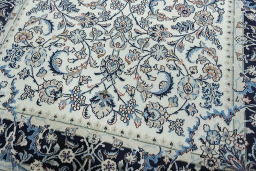 Close-up detail of 2000s Kashmar rug from Iran / Persia showing Wool weave