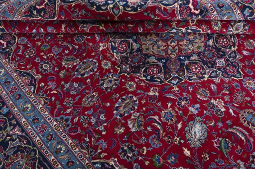 Corner detail of 2000s Kashmar rug showing border pattern and Wool pile