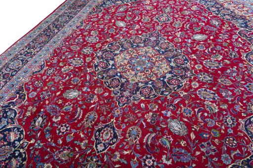Backside of handmade 2000s Kashmar rug showing knot structure and weave density