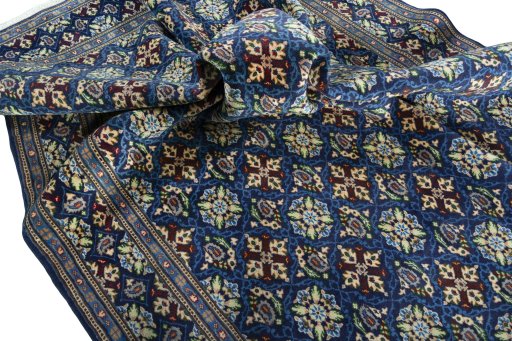 Corner detail of 2000s Kashmar rug showing border pattern and Wool pile