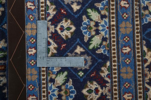 Close-up detail of 2000s Kashmar rug from Iran / Persia showing Wool weave