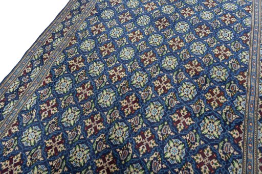 Backside of handmade 2000s Kashmar rug showing knot structure and weave density