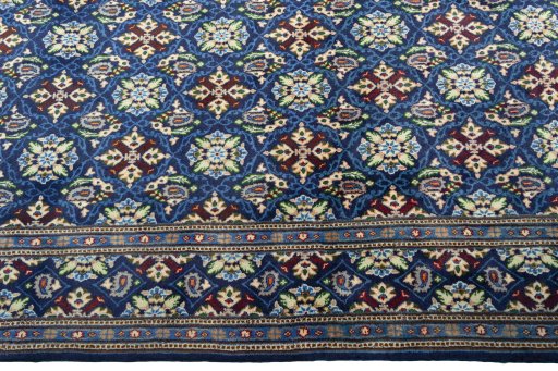 Close-up detail of 2000s Kashmar rug from Iran / Persia showing Wool weave