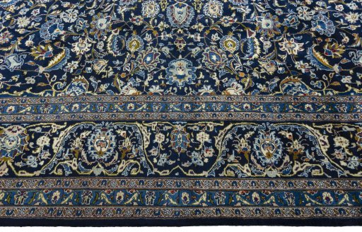 Corner detail of 2000s Kashmar rug showing border pattern and Wool pile