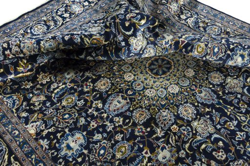 Surface texture of 2000s Kashmar rug with natural Wool and intricate pattern