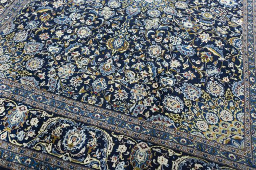 Close-up detail of 2000s Kashmar rug from Iran / Persia showing Wool weave