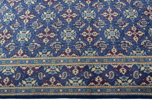 Close-up detail of 2000s Kashmar rug from Iran / Persia showing Wool weave