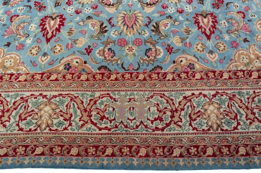 Corner detail of 1970s Kashmar rug showing border pattern and Wool pile