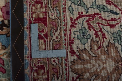 Backside of handmade 1970s Kashmar rug showing knot structure and weave density
