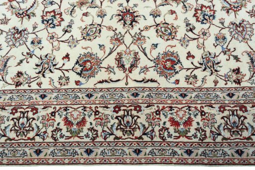 Corner detail of New Kashmar rug showing border pattern and Cork pile