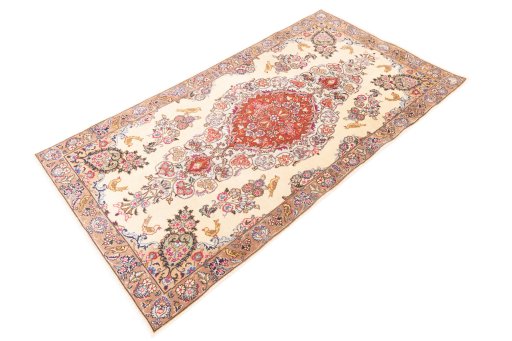 Close-up detail of 2005s Kashmar rug from Iran / Persia showing Wool weave