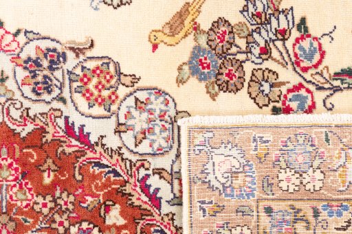 Close-up detail of 2005s Kashmar rug from Iran / Persia showing Wool weave