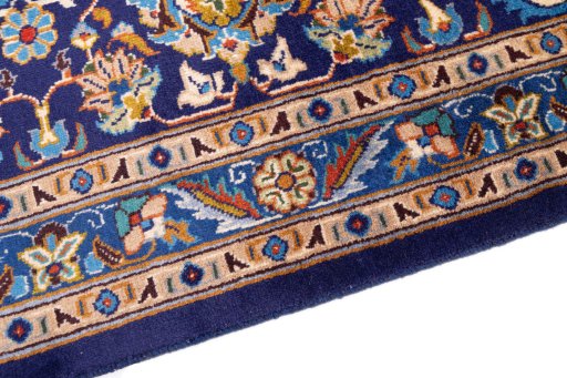 Backside of handmade 2003s Kashmar rug showing knot structure and weave density