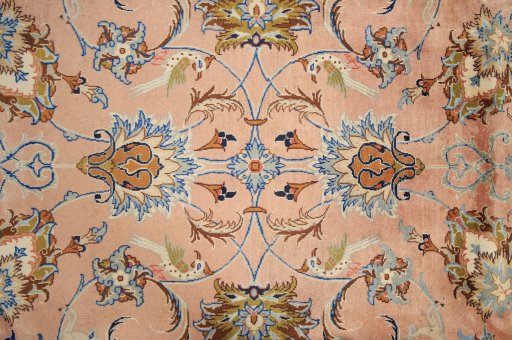 Corner detail of 1990s Kashmar rug showing border pattern and Wool pile