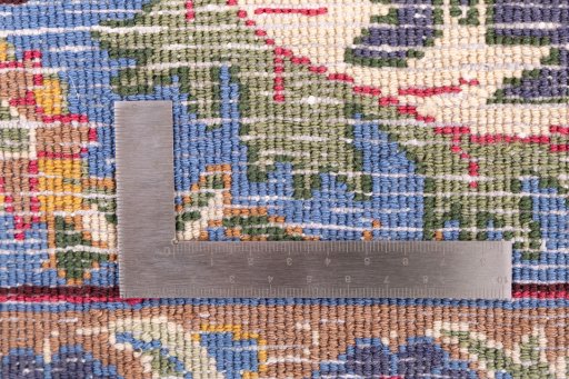 Corner detail of 1975s Kashmar rug showing border pattern and Wool pile