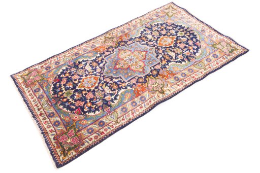 Corner detail of 1975s Kashmar rug showing border pattern and Wool pile