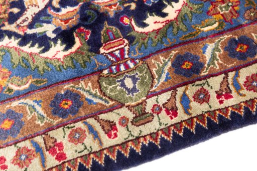 Backside of handmade 1975s Kashmar rug showing knot structure and weave density
