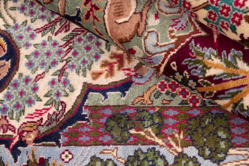 Surface texture of 2005s Kashmar rug with natural Wool and intricate pattern
