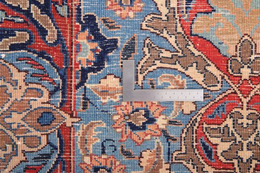 Backside of handmade 1960s Kashmar rug showing knot structure and weave density