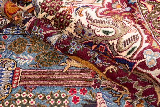 Backside of handmade 1960s Kashmar rug showing knot structure and weave density