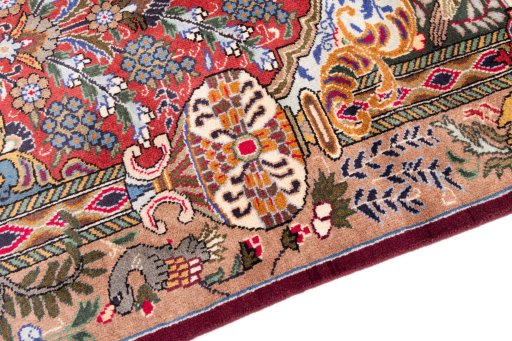 Backside of handmade 1960s Kashmar rug showing knot structure and weave density