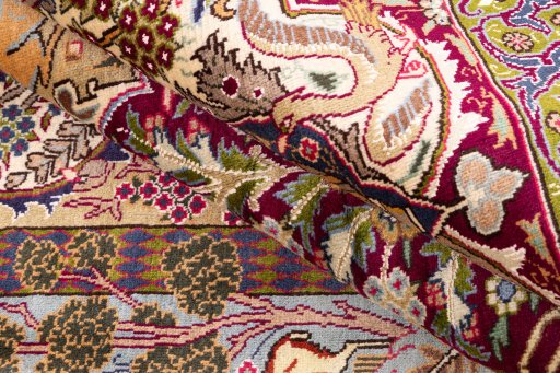 Surface texture of 1960s Kashmar rug with natural Wool and intricate pattern