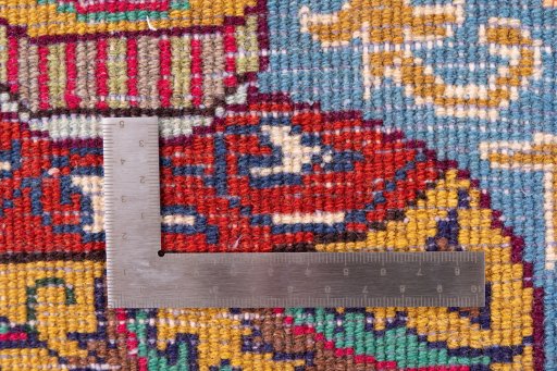 Backside of handmade 1965s Kashmar rug showing knot structure and weave density