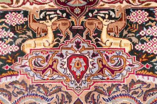 Corner detail of 1960s Kashmar rug showing border pattern and Wool pile