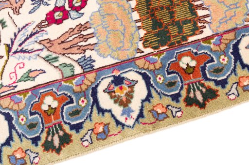 Backside of handmade 1975s Kashmar rug showing knot structure and weave density