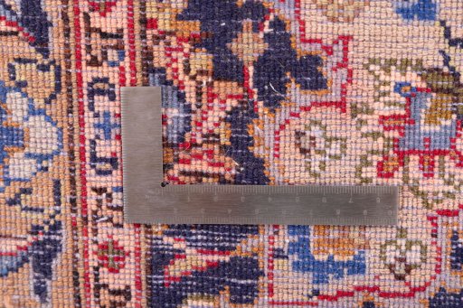 Corner detail of 1977s Kashmar rug showing border pattern and Wool pile