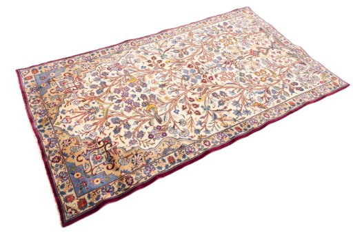 Corner detail of 2002s Kashmar rug showing border pattern and Wool pile