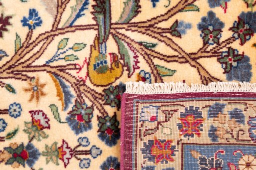 Close-up detail of 2002s Kashmar rug from Iran / Persia showing Wool weave
