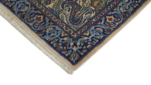 Surface texture of 1960s Kerman rug with natural Wool and intricate pattern