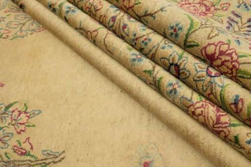 Corner detail of 1960s Kerman rug showing border pattern and Wool pile