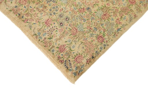 Backside of handmade 1960s Kerman rug showing knot structure and weave density
