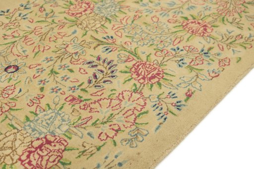 Close-up detail of 1960s Kerman rug from Iran / Persia showing Wool weave