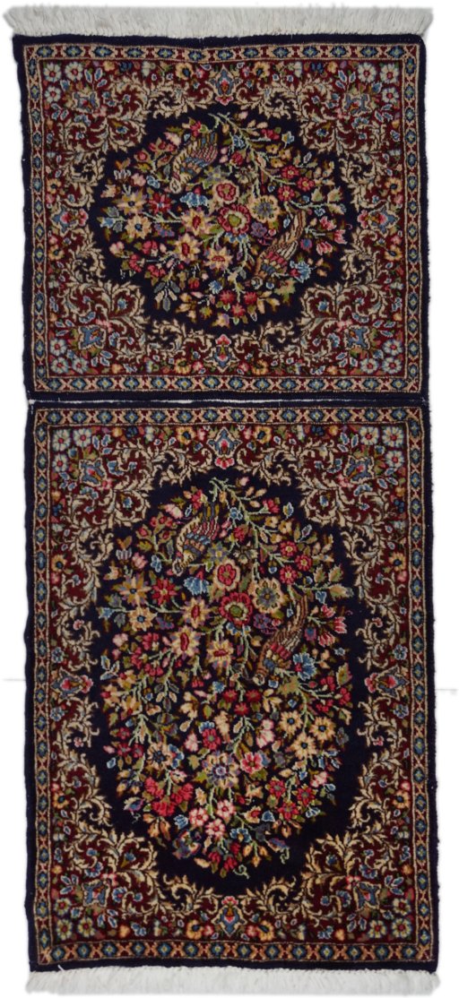 Full view of 1980s Kerman rug from Iran / Persia, 130 × 55 cm in Black tones