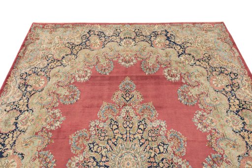 Surface texture of 1950s Kerman rug with natural Wool and intricate pattern
