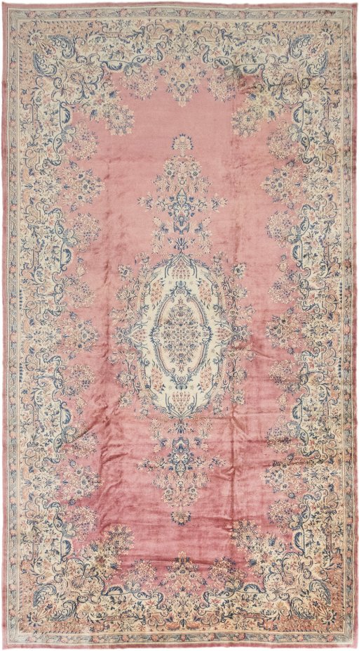 Full view of 1950s Kerman rug from Iran / Persia, 655 × 360 cm in Red tones