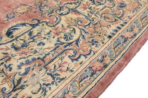 Close-up detail of 1950s Kerman rug from Iran / Persia showing Wool weave