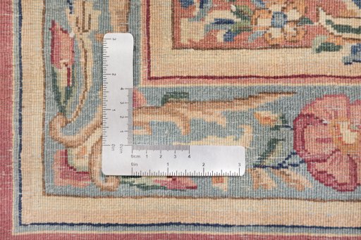 Surface texture of 1950s Kerman rug with natural Wool and intricate pattern