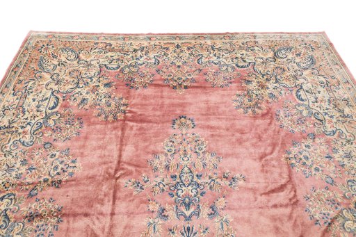 Surface texture of 1950s Kerman rug with natural Wool and intricate pattern