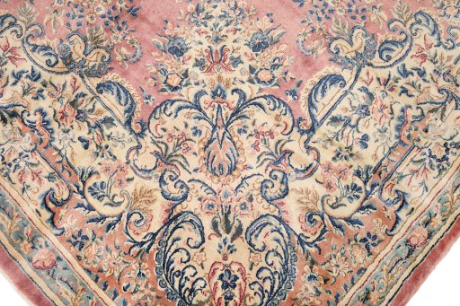 Close-up detail of 1950s Kerman rug from Iran / Persia showing Wool weave
