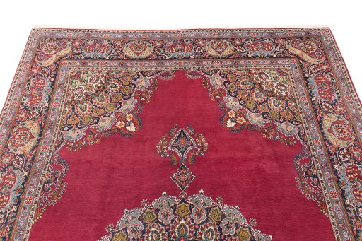 Surface texture of 1950s Kerman rug with natural Wool and intricate pattern