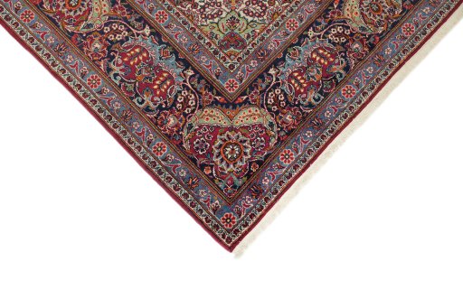 Backside of handmade 1950s Kerman rug showing knot structure and weave density