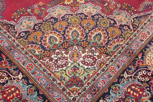 Full view of 1950s Kerman rug from Iran / Persia, 387 × 266 cm in Dark red tones