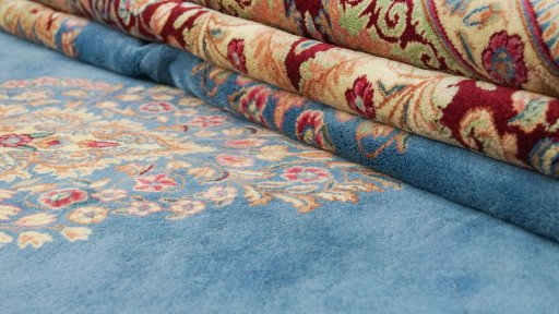 Full view of 1960s Kerman rug from Iran / Persia, 486 × 298 cm in Blue tones