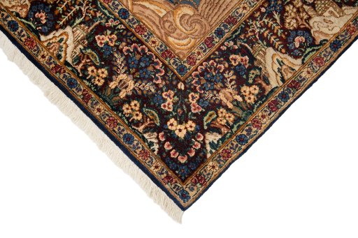 Backside of handmade 1960s Kerman rug showing knot structure and weave density
